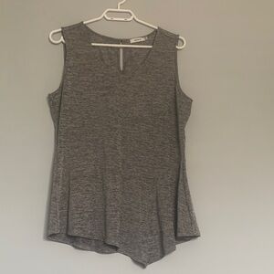 Ricki’s size L peplum tank